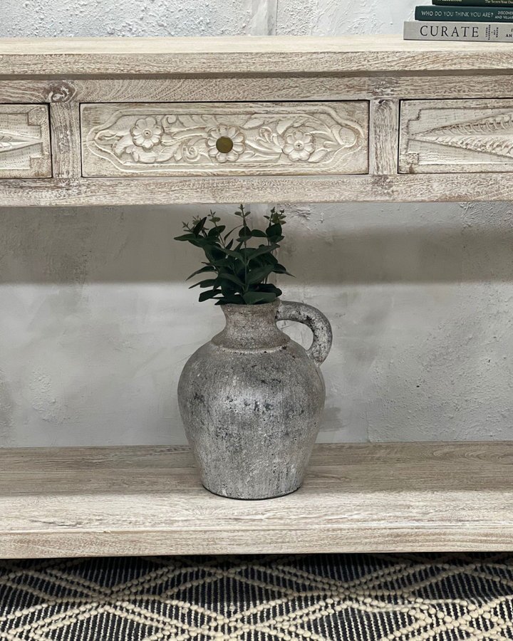 sandblasted carved console table