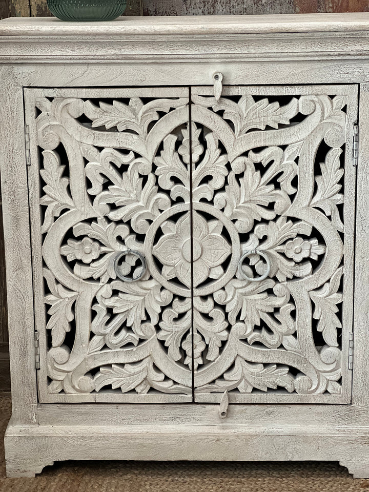 Hand carved four door sideboard