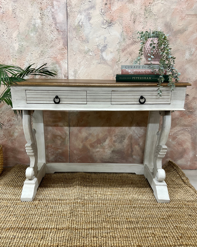 Hand carved console table with intricate legs